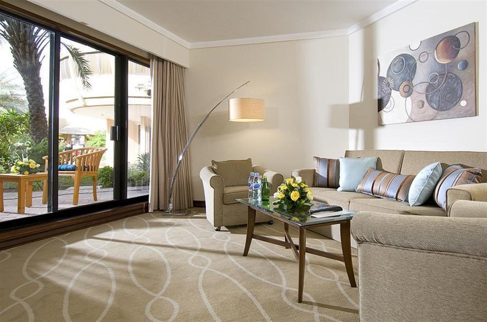 Danat Al Ain Resort Exterior photo A living room at the Four Seasons Hotel, Cairo