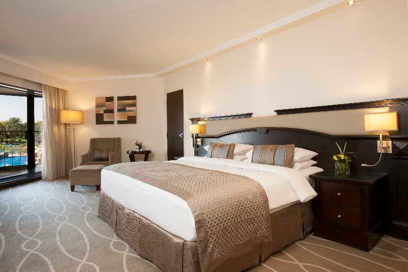 Danat Al Ain Resort Exterior photo A bedroom at the hotel