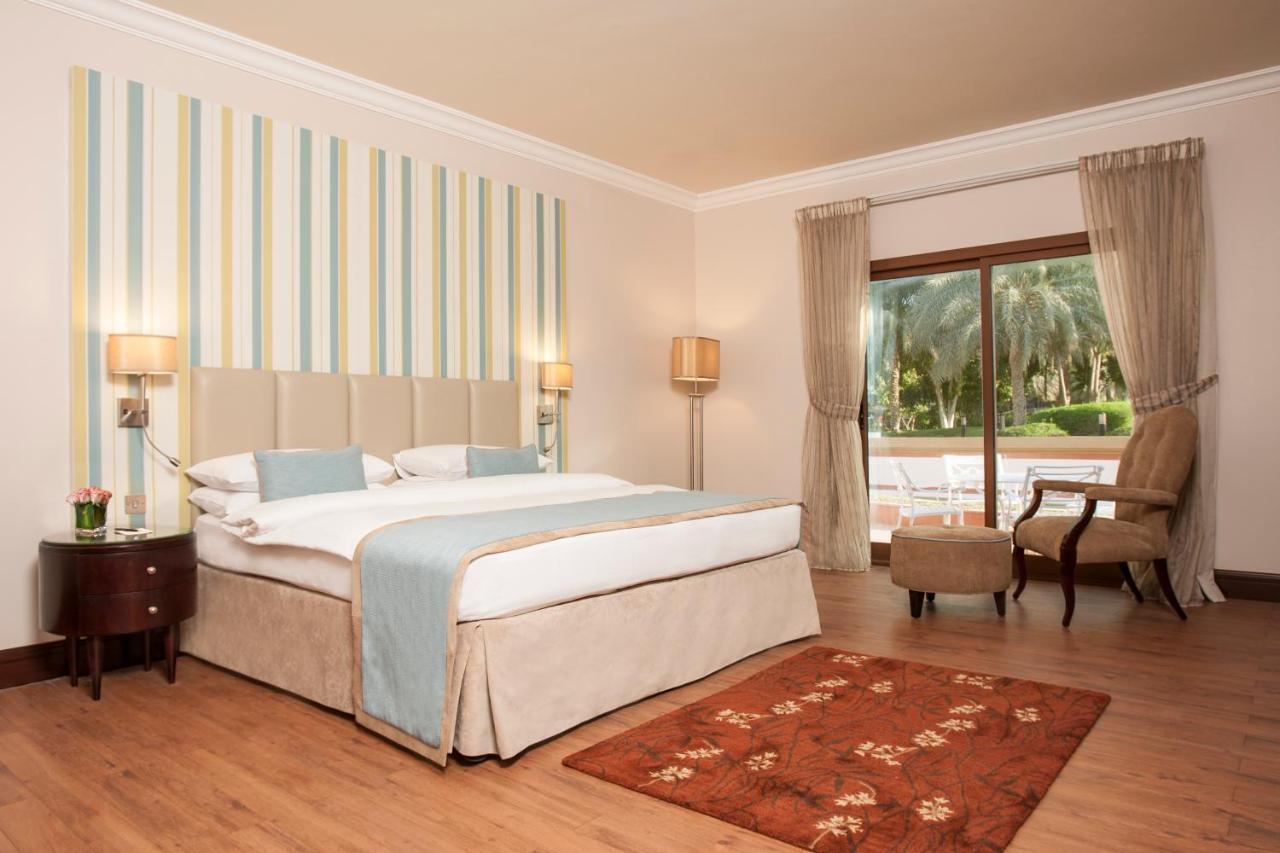 Danat Al Ain Resort Exterior photo A bedroom at the hotel